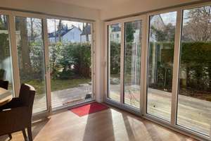 Wohnen im Grünen – stilvolle Gartenwohnung mit zwei Terrassen
