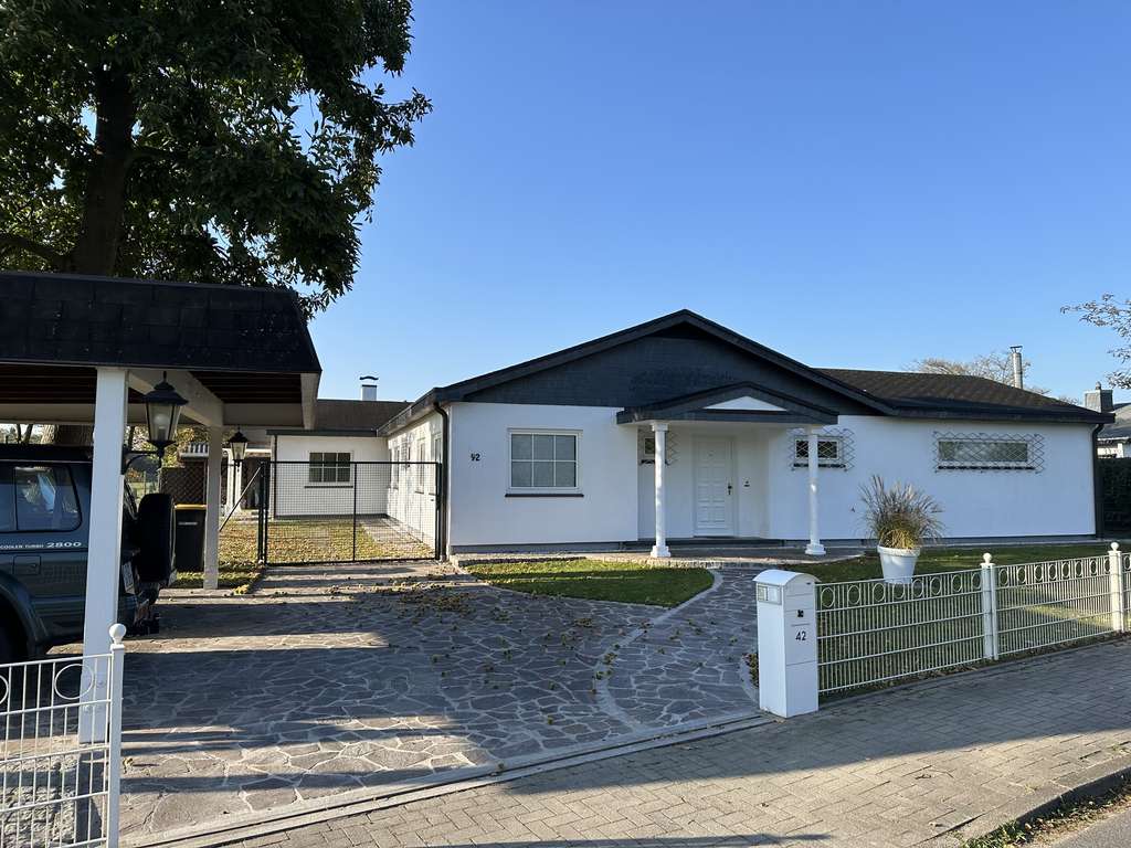 Immobilie in Ellerbek - Hochwertiger amerikanischer Bungalow in ruhiger Lage mit separater Einliegerwohnung - Bild 0