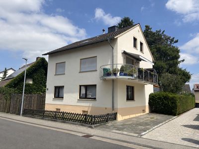Gepflegtes Dreifamilienhaus mit idyllischem Sonnengarten im exklusiven Musikerviertel von Hangelar