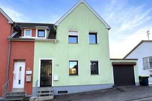 Sonniges Familienhaus mit Garten, Garage & ELW!