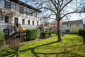 Lichtdurchflutete Altbauwohnung auf beeindruckendem Gartengrundstück in Bonn-Kessenich