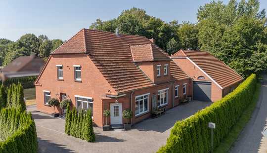 Bild von Vielseitiges Wohn- und Geschäftskonzept mit hochwertiger Außenanlage auf großem Grundstück