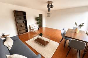 Wohnen im Grünen in Milbertshofen: moderne, MÖBLIERTE 3-Zimmer-Wohnung mit sonnigem Balkon