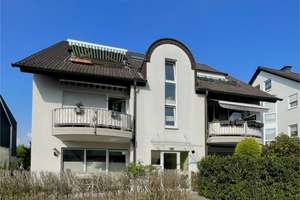 Außergewöhnliche Maisonette-Wohnung mit ruhigem Sonnenbalkon