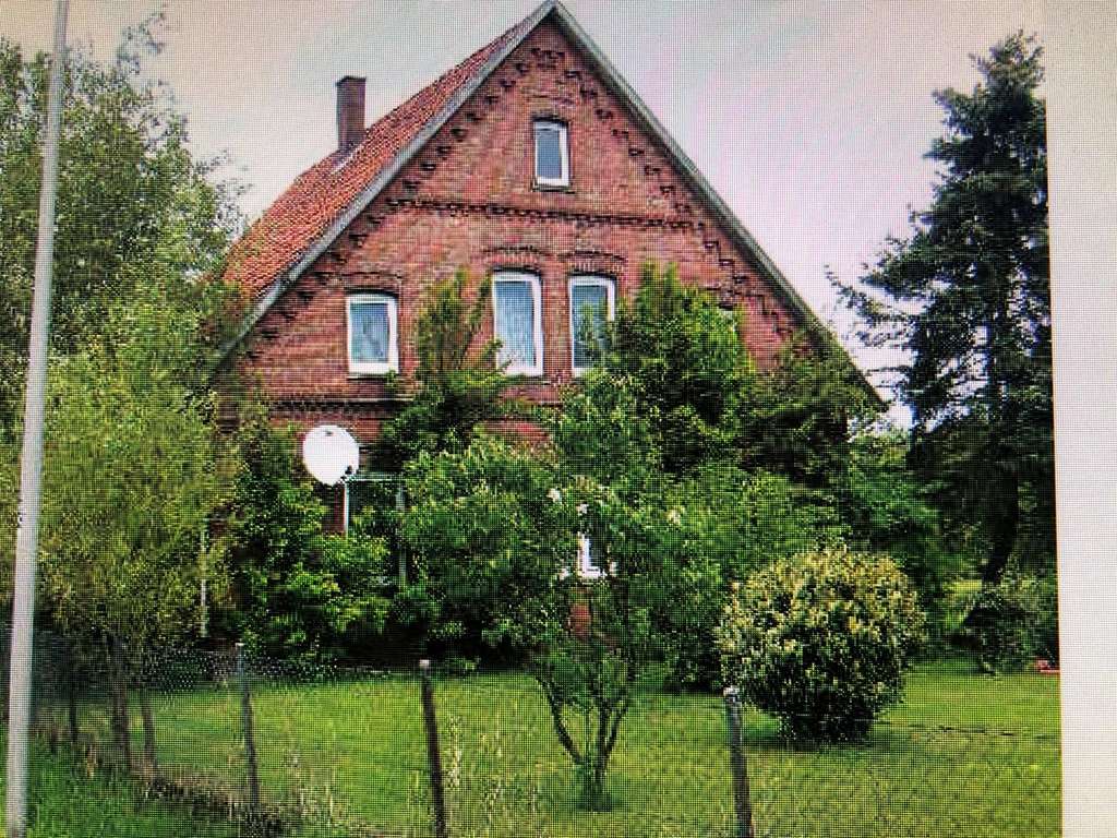 Immobilie in Niedernwöhren - Großzügiges Zweifamilienhaus mit großem Grundstück und Ausbaureserve in Niedernwöhren - Bild 1