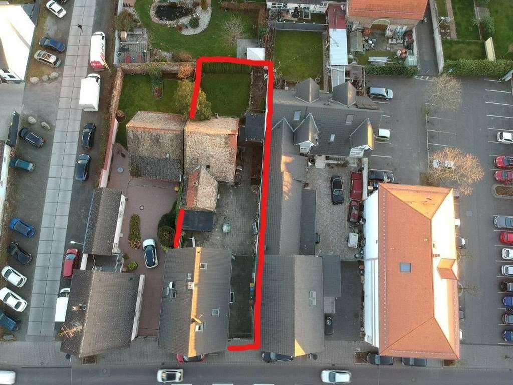 Immobilie in Raunheim - Gepflegtes Mehrfamilienhaus mit integrierter Gewerbefläche und weiterem Entwicklungspotenzial - Bild 0