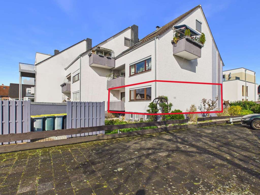 Immobilie in Bruchköbel - Großzügige Eigentumswohnung mit 2 Balkonen, Garage & Gartenanteil - Bild 1