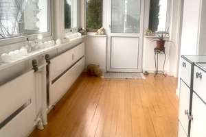 Charmante 4-Zimmer-Altbauwohnung mit Wintergarten und Privatgarten in begehrter Lage von Baden-Baden