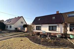 Doppelhaushälfte in Sandersdorf: Familienfreundlich, mit Garten, Garage und ca. 600 m² Grundstück – Schillerstraße 40, 6792 Sandersdorf – Vorschaubild 3