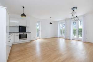 Moderne Erdgeschosswohnung mit eigenem Gartenanteil