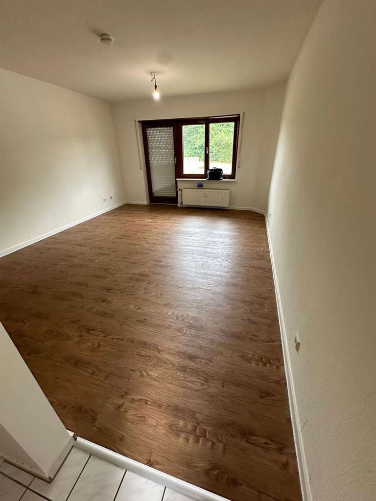 Immobilie in Nußloch - Helle 1-Zimmerwohnung in zentraler Verkehrslage von Nußloch... - Bild 2