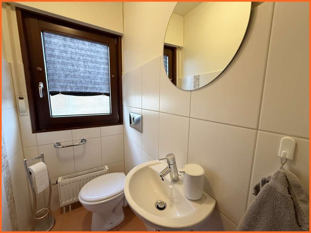 Immobilie in Gau-Bickelheim - Charmantes Einfamilienhaus mit Wellnessbereich, großem Garten und Weinbergblick! - Bild 5