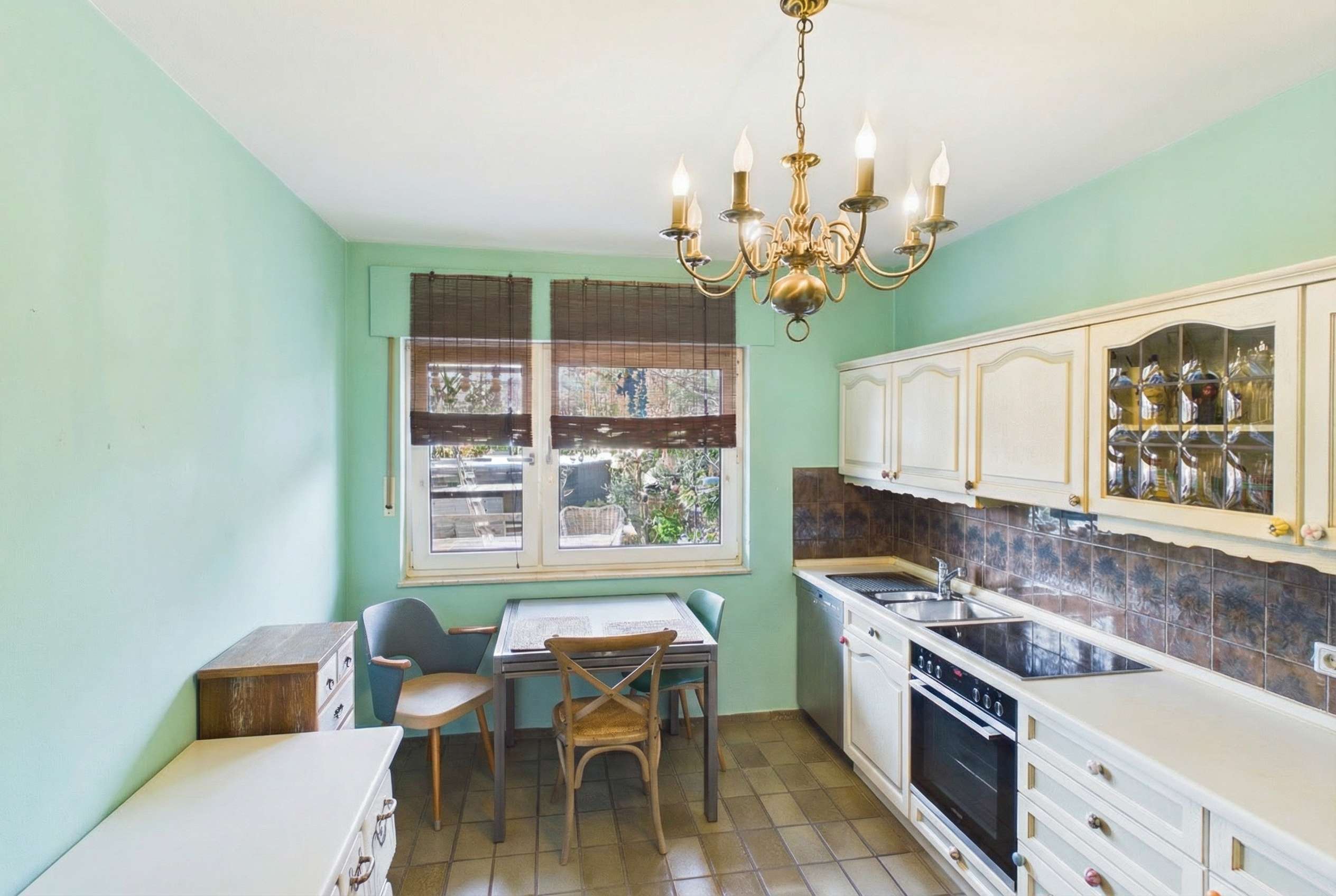 Immobilie in Hamminkeln - Splitlevel-Reihenmittelhaus mit Garage in zentraler, ruhiger Wohnlage - Bild 1