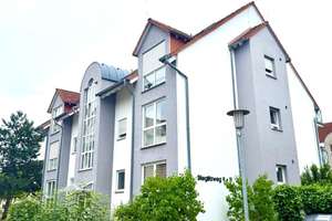 Maisonette-Wohnung mit Balkon und Tiefgaragenstellplatz in ruhiger Wohnlage