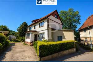 1-2 Familienhaus auf 180 m² Wohnfläche, 1.500 m² Grundstück, 2 Garagen und großzügiger Garten
