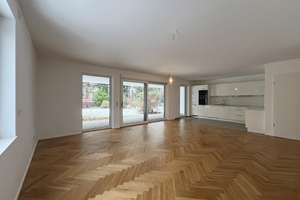 Neubau-Erdgeschosswohnung mit hochwertiger Ausstattung und Gartenanteil