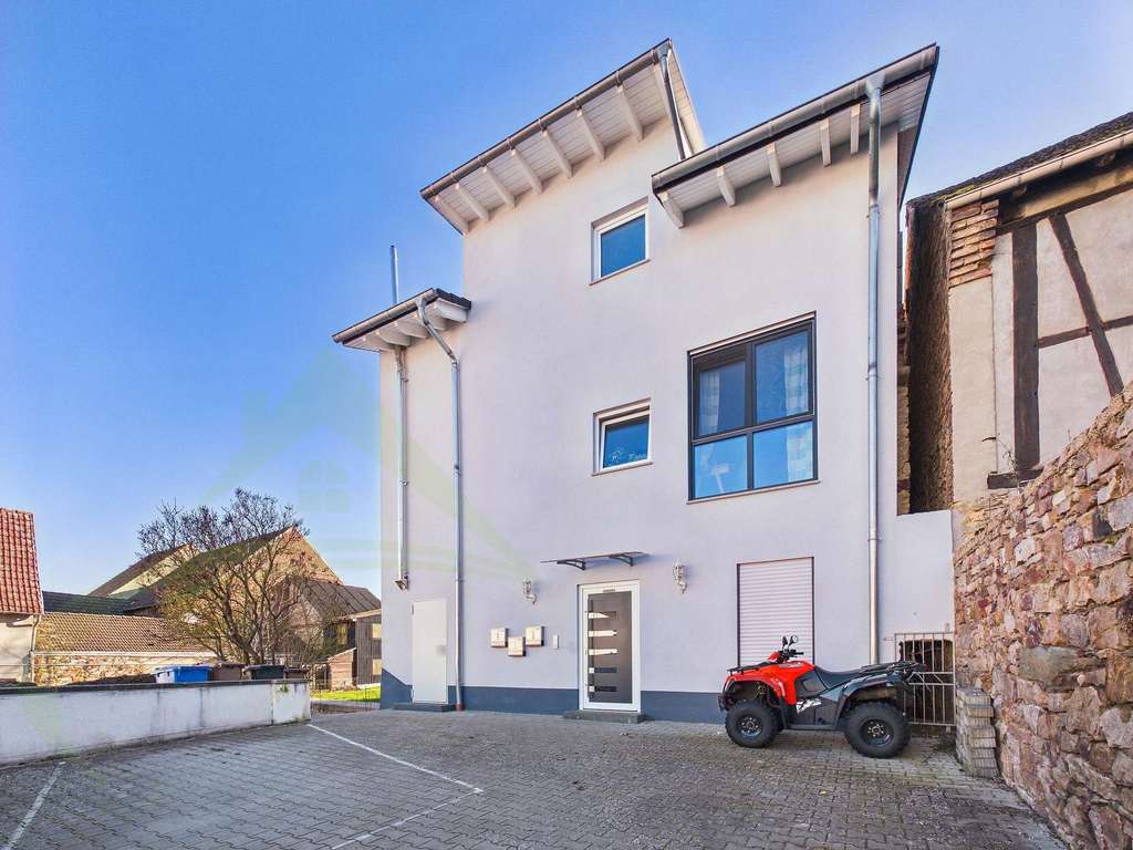 Immobilie in Hünfelden - Kapitalanlage mit Zukunft: Gepflegtes Mehrfamilienhaus Baujahr 2017 - Bild 2