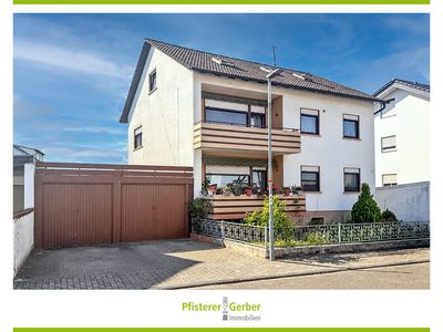 Wohnen mit vielen Möglichkeiten – Dreifamilienhaus mit vier Garagen in Weiher