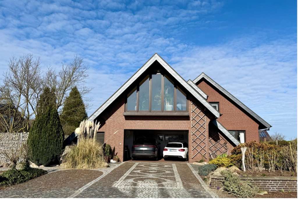 Immobilie in Drebber - Großzügiges Einfamilienhaus mit modernem, offenen Wohnkonzept und hochwertigem Garten - Bild 2