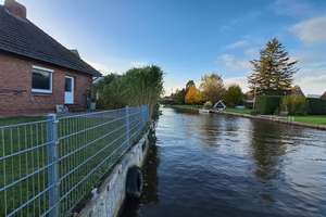 Ruhig und direkt am Wasser: renovierter 4-Zimmer-Bungalow in Loppersum, Hinte. Provisionsfrei! – Loppersumerstraße 24, 26759 Hinte – Vorschaubild 24