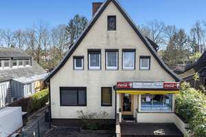 Einfamilienhaus mit Gewerbeeinheit und Gästehaus in bester Lage