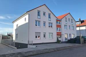Dachgeschosswohnung mit Einbauküche, Balkon, Keller und Tiefgarage in Bellheim