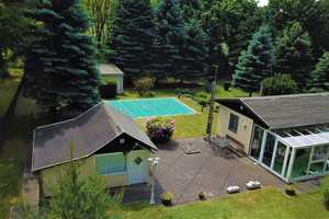 Idyllischer Ferienbungalow mit Wintergarten und Pool – Hohenlubast 46, 6773 Wittenberg (Kreis) – Vorschaubild 1