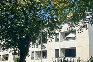 Grünes Wohnen in begehrter Lage – stilvolle Eigentumswohnung mit Garage