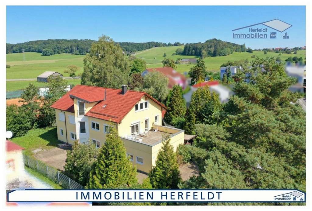 Immobilie in Ottobeuren - 8% Rendite! Vielseitiges Wohn- und Gewerbeanwesen mit zusätzlichem Baugr. für Gewerbe in Ottobeuren - Bild 0