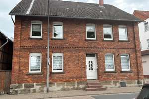 Wohnen & Arbeiten unter einem Dach - Großzügiges Zweifamilienhaus mit Halle und viel Potenzial