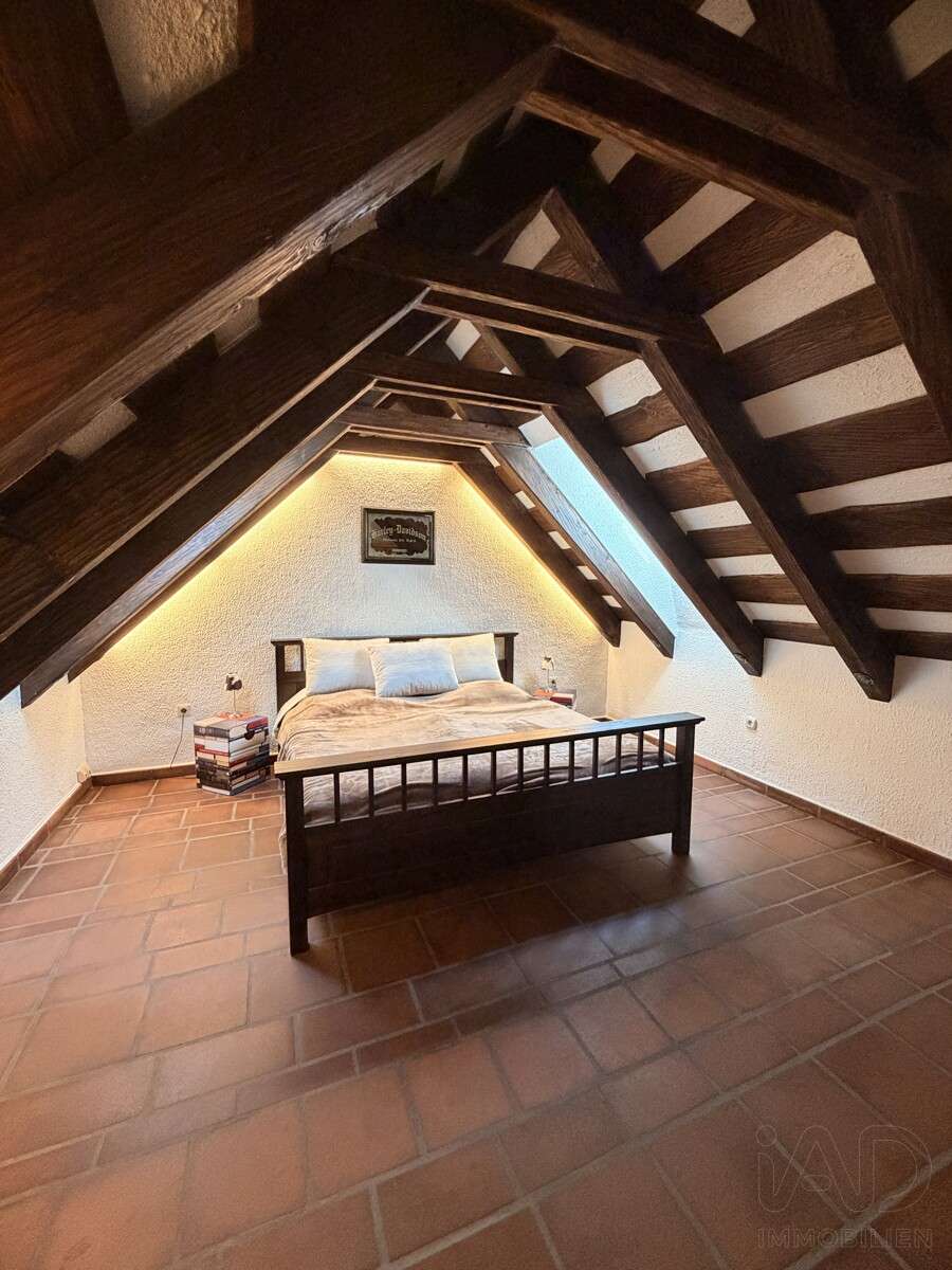 Immobilie in Kirchheim bei München - Schlossburg-Charakter trifft mediterranes Wohngefühl – außergewöhnliche Maisonette auf zwei Ebenen - Bild 13