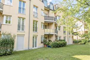 Sonnige Eigentumswohnung mit Terrasse und Tiefgaragenstellplatz in Spitzenlage!