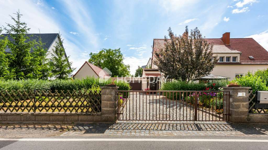 Immobilie in Wurzen - Idyllische Wohnqualität mit Garage, Garten, überdachter Südterrasse, Nebengebäude & Raumvielfalt - Bild 1