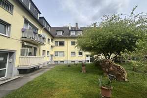 Helle Erdgeschosswohnung mit Balkon & Blick ins Grüne