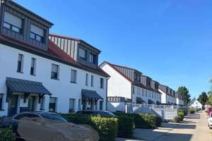Maisonettewohnungen im Reihenhausstil mit kleinem Garten+Süd-Terrasse