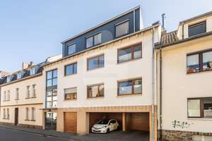 Moderne Dachgeschosswohnung mit Dachterrasse und 2 Stellplätzen!