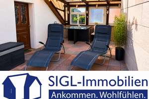 Wohnen mit Hauscharakter – großzügige 5-Zimmer-Wohnung mit Wohnküche, Veranda, Balkon und Garage