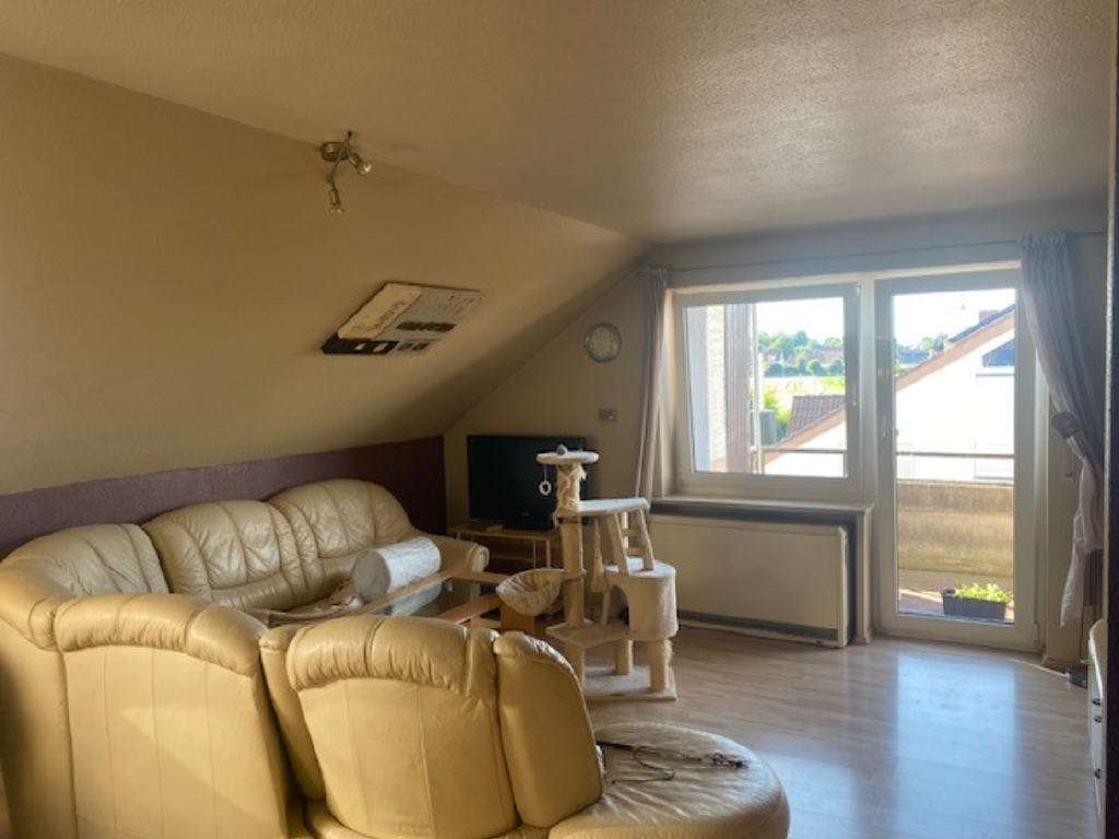 Immobilie in Pfullendorf - Charmante Dachgeschosswohnung in gepflegtem
Mehrfamilienhaus mit Balkon und Garage - Bild 6