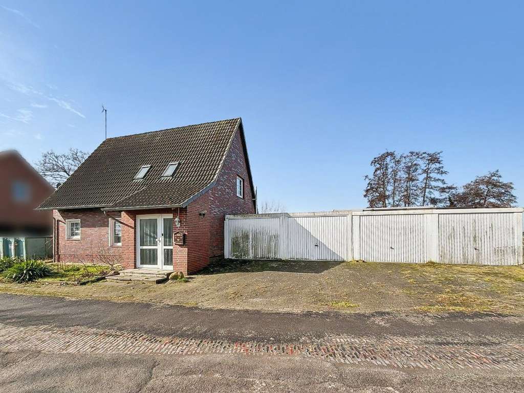 Immobilie in Butjadingen - Feines Wohnhaus auf ca. 1.527 m² Grund mit Sanierungsbedarf in Eckwarden nahe Nordseebad Tossens - Bild 1
