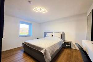 Kernsaniertes MFH: A+ Effizienz, Wärmepumpe, PV-Anlage, 3 Stellplätze und UG-Nutzung – Die vollständige Adresse der Immobilie erhältst du vom Anbieter., 79183 Waldkirch – Vorschaubild 8