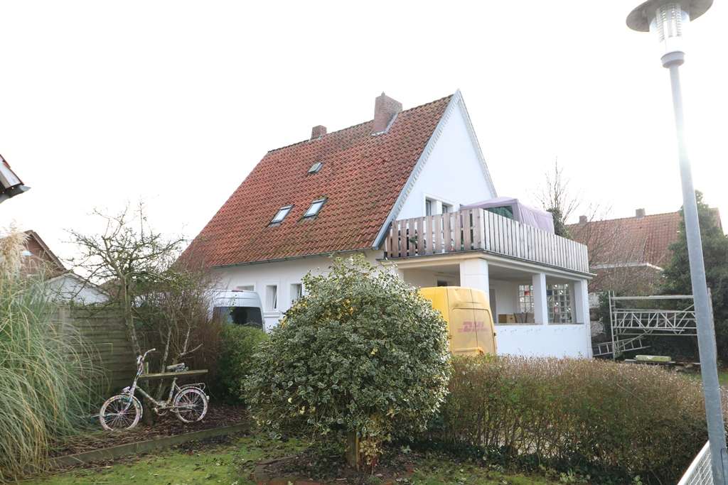 Immobilie in Quakenbrück - Modernisiertes, gepflegtes Zweifamilienhaus mit Keller, Garage und großem Garten - Bild 0