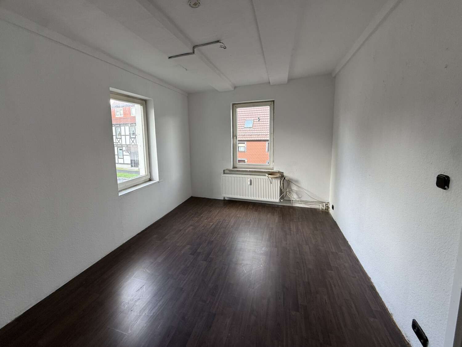 Immobilie in Herzberg am Harz - Schönes Mehrfamilienhaus mit einer Wohnfläche von ca. 328 m² und einem Grundstück von ca. 528 m² - Bild 12