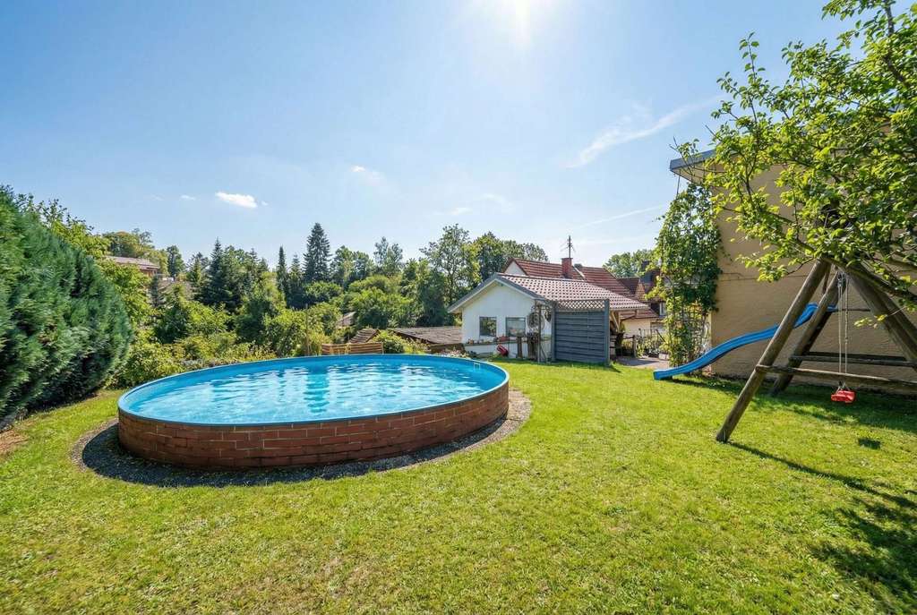 Immobilie in Au in der Hallertau - Einfamilienhaus mit Außenpool und Potenzial - Bild 0