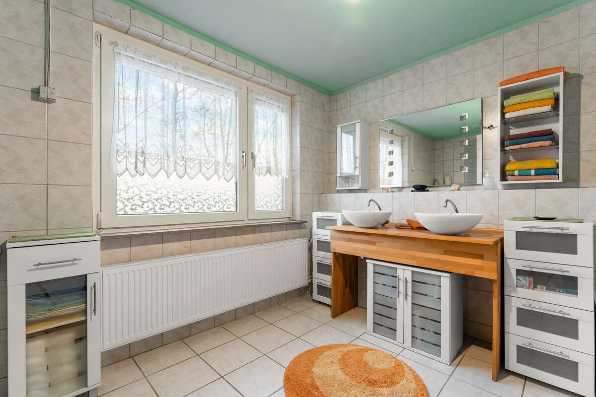 Immobilie in Wangerland - Charmantes Wohnensemble in unmittelbarer Nordseenähe – Leben mit Küstengefühl - Bild 9