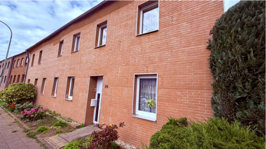 Immobilie in Niederzier - Analgeobjekt Zwei- bis Dreifamilienhaus mit 3 Garagen - Bild 0