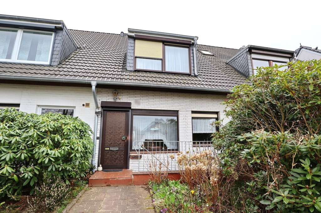 Immobilie in Henstedt-Ulzburg - Modernisierungsbedürftiges Reihenmittelhaus in zentaler Lage von Henstedt-Ulzburg - Bild 1