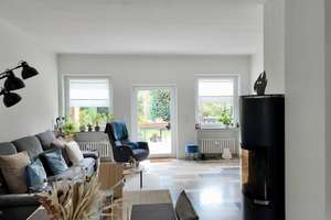 Haus im Haus: Garten, Stellplatz, Kamin & Kegelbahn – eine besondere EG-Wohnung