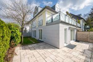 AIGNER: Garten-Oase mit Charme: Helle Erdgeschosswohnung mit flexiblem Grundriss