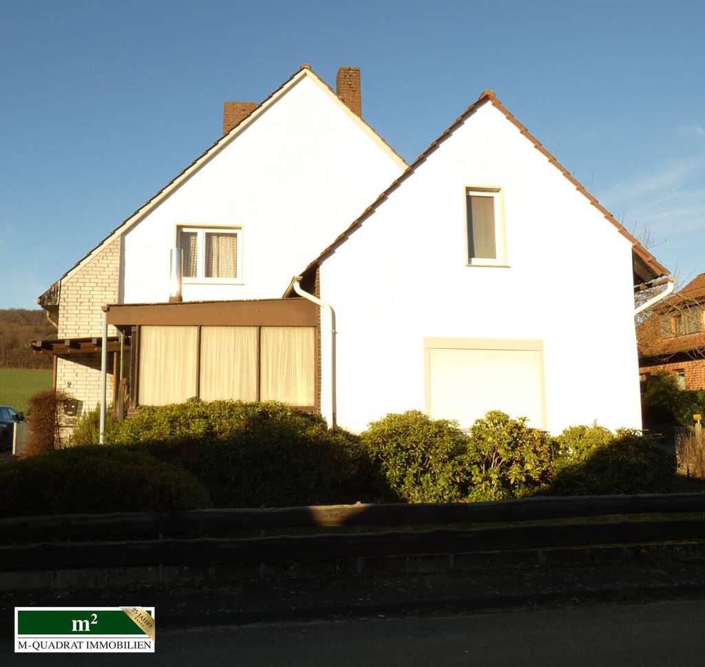 Immobilie in Dissen - Solides Wohnhaus mit Garage und Gartenanteil in ruhiger Siedlungslage von Dissen aTW - Bild 0