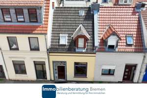 Renovierungsbedürftiges Reihenmittelhaus mit Terrasse